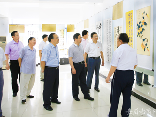【九州·体育(中国)官方网站】淮北师大举行庆祝中国共产党成立95周年暨红军长征胜利80周年书画展
